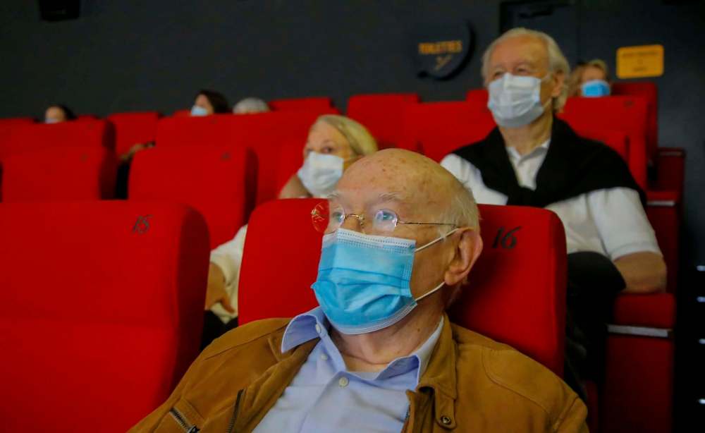 Michel Euler / The Associated Press FILES
Many people are mistrustful of masks because of what they feel to be mixed messages about their effectiveness; in the U.S., masks have become a political statement.