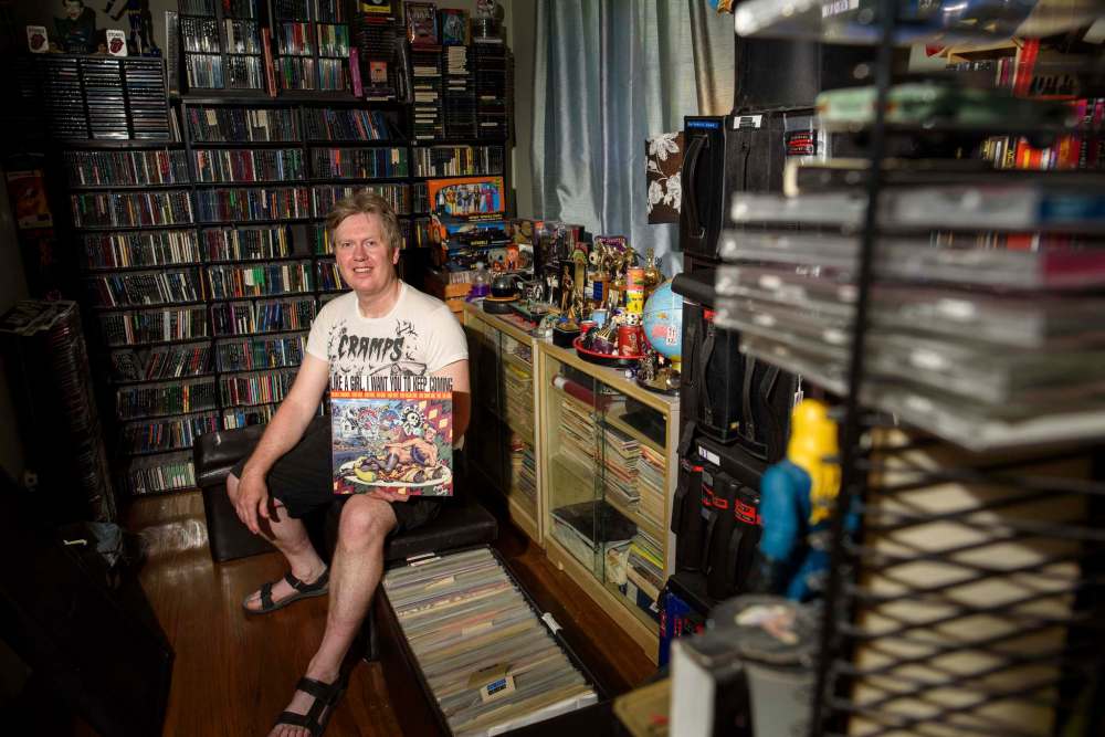 JESSE BOILY / WINNIPEG FREE PRESS
Glen Morris with his collection of CD’s, cassettes, and vinyl.