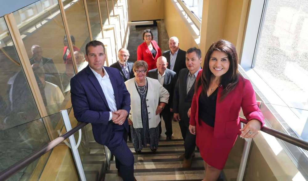RUTH BONNEVILLE / WINNIPEG FREE PRESS
At the announcement of TIPI Insurance Partners’ acquisition of a controlling stake in Legacy Bowes Thursday were Legacy Bowes Group president Barbara Bowes (centre, with clockwise from left), TIPI Insurance Partners CEO Nathan Ballantyne, Bill Medd of Legacy Bowes, TIPI Insurance operations manager Janice Gladu, TIPI Insurance’s Kent Cook, Legacy Bowes’ Paul Croteau, Rob Veito of TIPI Insurance and Lisa Cefali of Legacy Bowes.