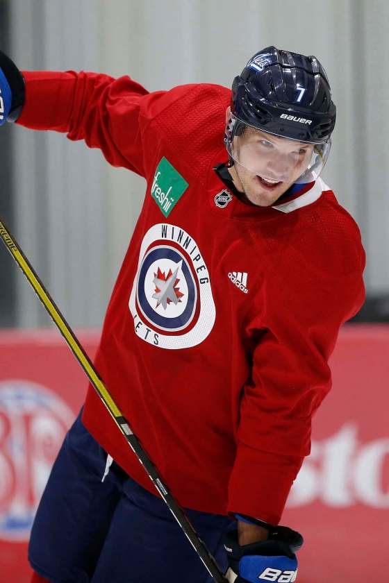 Jets defenceman Dmitry Kulikov says the team is looking surprisingly sharp in practice. (John Woods / The Canadian Press files)