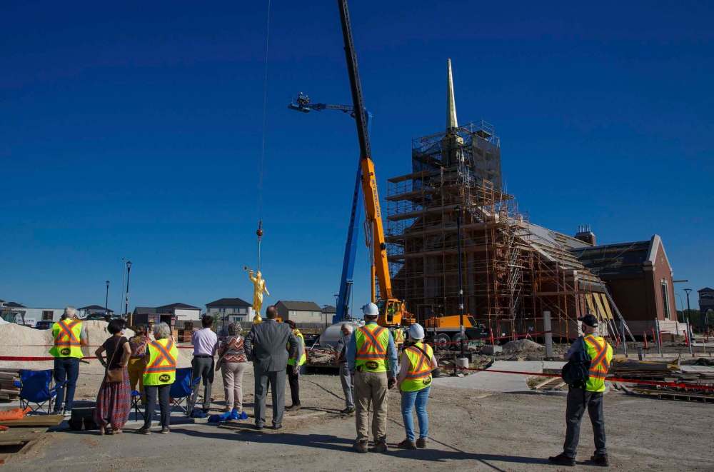 MIKE DEAL / WINNIPEG FREE PRESS
Moroni will be seen on top of the temple blowing a trumpet and standing atop a globe, symbolizing the spreading of the gospel of Jesus Christ. Identical statues are found on almost all of the church’s 168 temples worldwide.