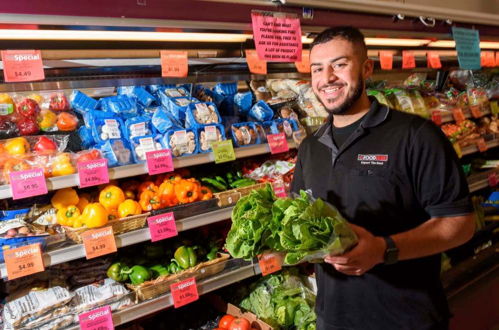 JESSE BOILY / WINNIPEG FREE PRESS
Tarik started helping out in the stores in Grade 6 and has graduated from shelf-stocker to “grocery boy” to produce manager over the last decade.