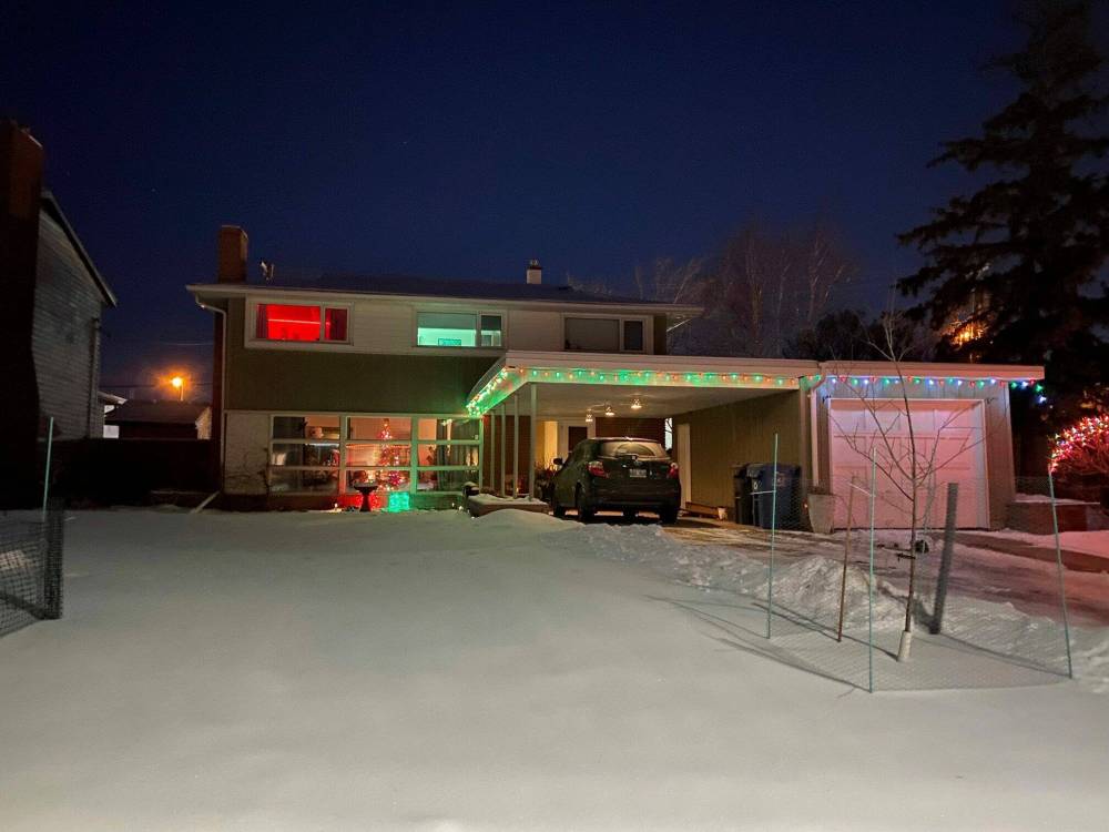 Ben Sigurdson / Winnipeg Free Press
The house was decked out just enough for the holidays, with one of the new trees in the foreground.