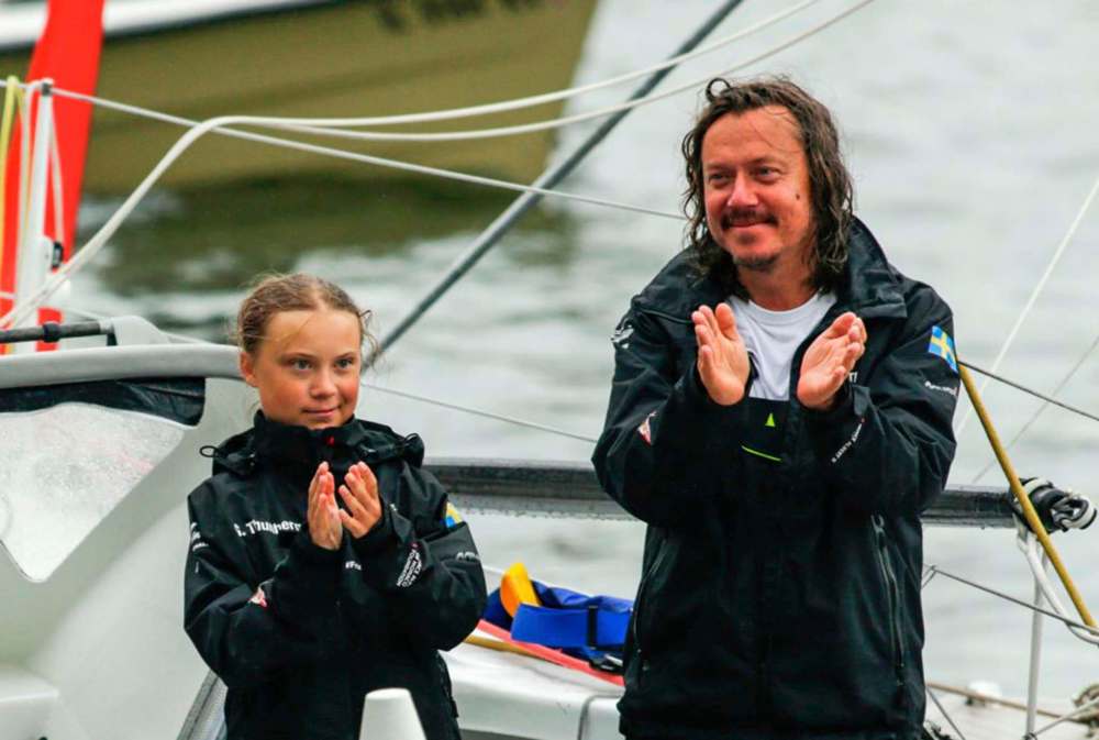 KENA BETANCUR / AFP
In this 2019 photo, Swedish climate activist Greta Thunberg (left) and her father SvanteThunberg arrive in the U.S. after a 15-day journey crossing the Atlantic in a zero-carbon yacht.