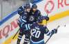 Jets forwards Nikolaj Ehlers, Mathieu Perreault and Cody Eakin, from left, celebrate a goal against the Flames during Tuesday’s Game 4 loss. (Jason Franson / The Canadian Press files)