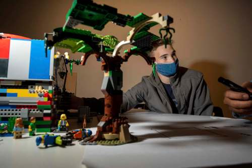 Lucas John Ursel, 15, learns how to draw a model home at the City Builders Camp at Artspace. (Jesse Boily / Winnipeg Free Press)
