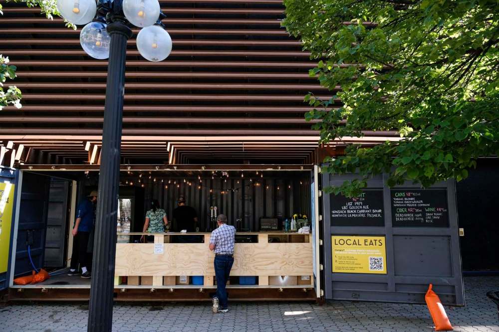 Daniel Crump / Winnipeg Free Press
A customer orders from the bar at Bijou Patio.