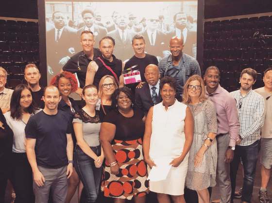 SuppliedJohn Lewis, centre, joins documentary crew members including Laura Michalchyshyn, fourth from right.