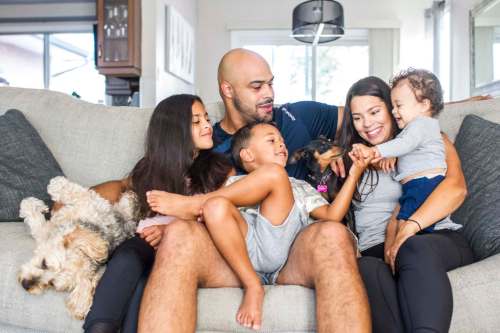 Jason Vega, with children Jazi, 8, Adrian, 3, and Evan, 11 months, and wife, Brittany, has become a true-blue Winnipegger.