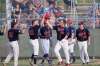 JOHN WOODS / WINNIPEG FREE PRESS
Elmwood Giants players congratulate Kevin Burnett after he scores a home run against the Interlake Blue Jays in game 3 of the Manitoba Junior Baseball League playoffs in Winnipeg Wednesday.
