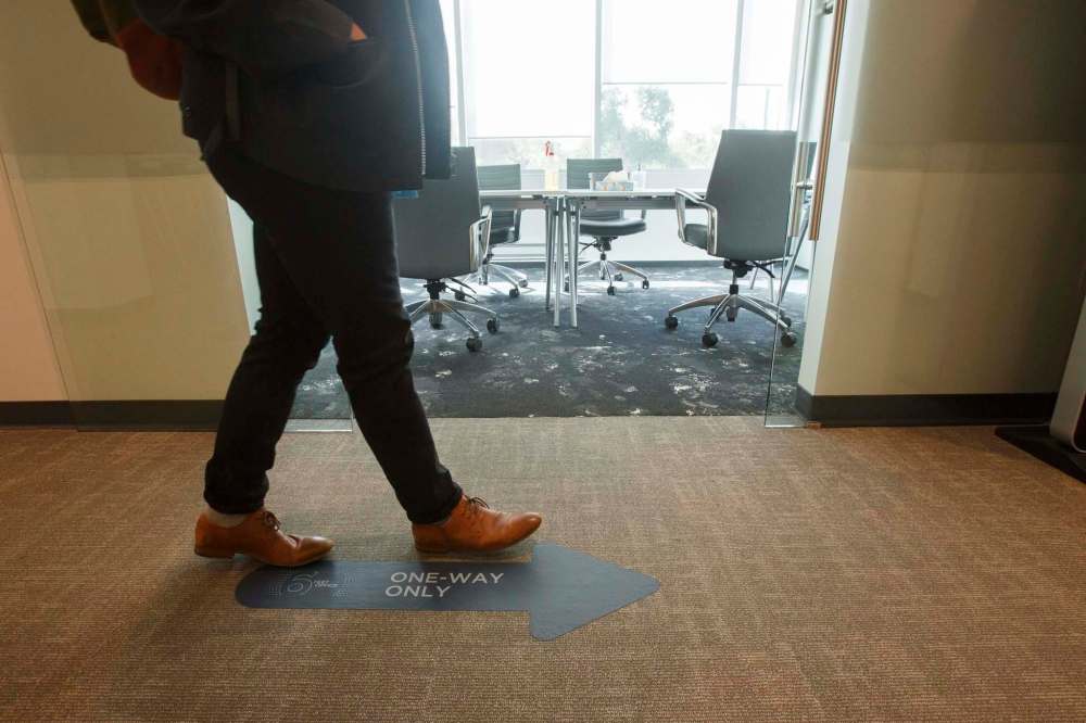 One-way arrows keep traffic flowing in a clockwise direction. (Mike Deal / Winnipeg Free Press)