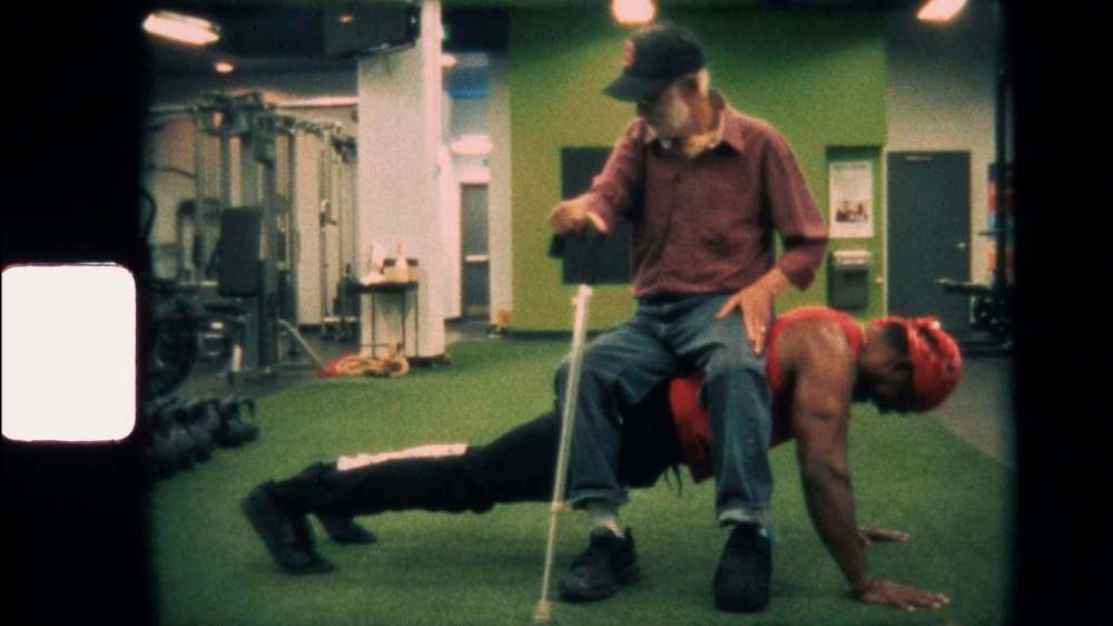 SUPPLIED
Filmmaker Ian Bawa's dad, Jagdeep Singh Bawa, sits on Mandeep Sodhi's back in Strong Son