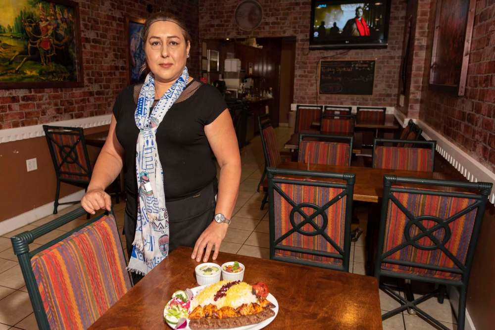 JESSE BOILY / WINNIPEG FREE PRESS
Maryam Nadmeh, owner of Tehran Cafe, shows off the Vaziri kebab platter.