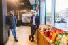 Mottola Grocery owner Bobby Mottola (left) with True North Real Estate Development president Jim Ludlow at the soft opening of the new store. (Mikaela MacKenzie / Winnipeg Free Press)