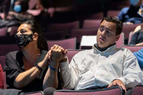 JESSE BOILY / WINNIPEG FREE PRESS
Sam Mercier prepares to hear the good news Wednesday night alongside mother Linda. The Grade 11 student at St. Maurice School won the top prize at the Diverse Minds competition for his story ‘My Name is Sam and Yes I can!&rsquo;