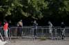 People wait in line at a mobile testing center in Marseille, France on Thursday as the closure of all restaurants and bars in the Marseille region were imposed to stem the resurgent spread of the virus. (AP Photo/Daniel Cole)