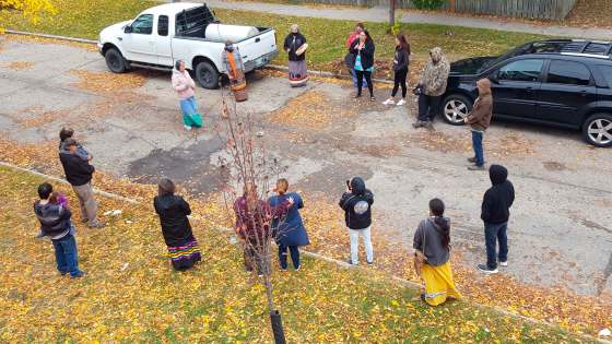 Community members held a memorial Sunday for the victims of the crash. (Supplied)
