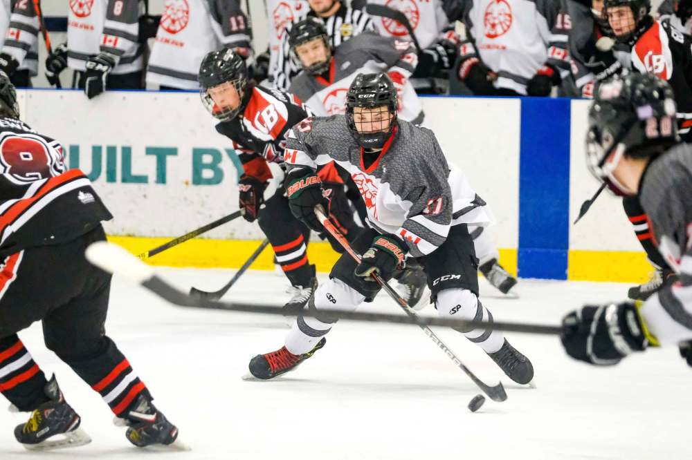 Daniel Crump / Winnipeg Free Press Files
Glenlawn Lions take on the College Beliveau Barracudas in the A Division High School Hockey Championships in March. With Hockey Manitoba poised Thursday to enter Phase 3 of its return-to-play protocol during the COVID-19 pandemic, indecision at the school division level has thrown the season into turmoil.