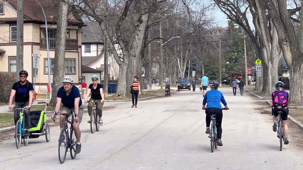 CREDIT: Brent Bellamy
Cyclists and pedestrians took full advantage of the ‘open streets’ concept along Wolseley Avenue.