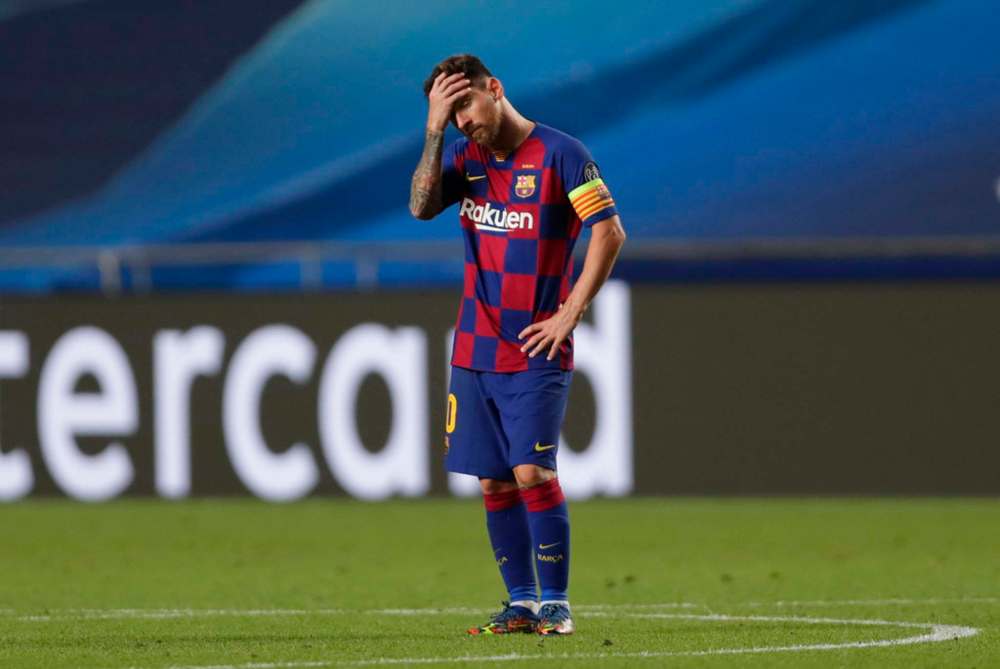 FC Barcelona's Lionel Messi reacts after 8-2 loss to Bayern Munich in Champions League quarter-final. (Manu Fernandez/Getty Images/TNS)