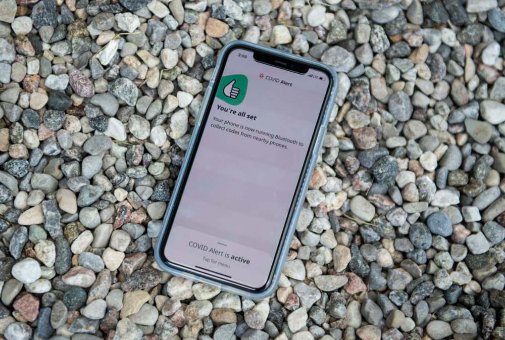 The COVID Alert APP tracks the location of phones relative to other phones, and notifies users if they have been in proximity to another app user who has tested positive for COVID-19. THE CANADIAN PRESS/Justin Tang