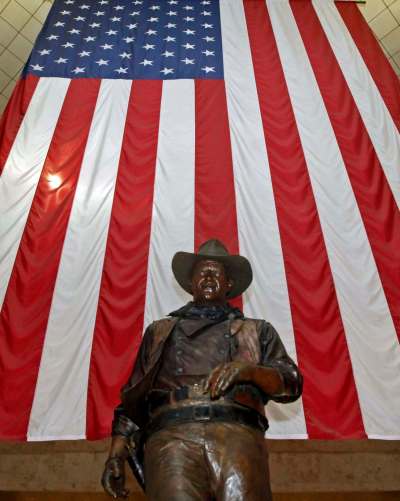 Reed Saxon / The Associated Press Files
Author Kristin Kobes Du Mez says American evangelicals support Donald Trump because he embodies values represented by the rugged manliness of John Wayne.