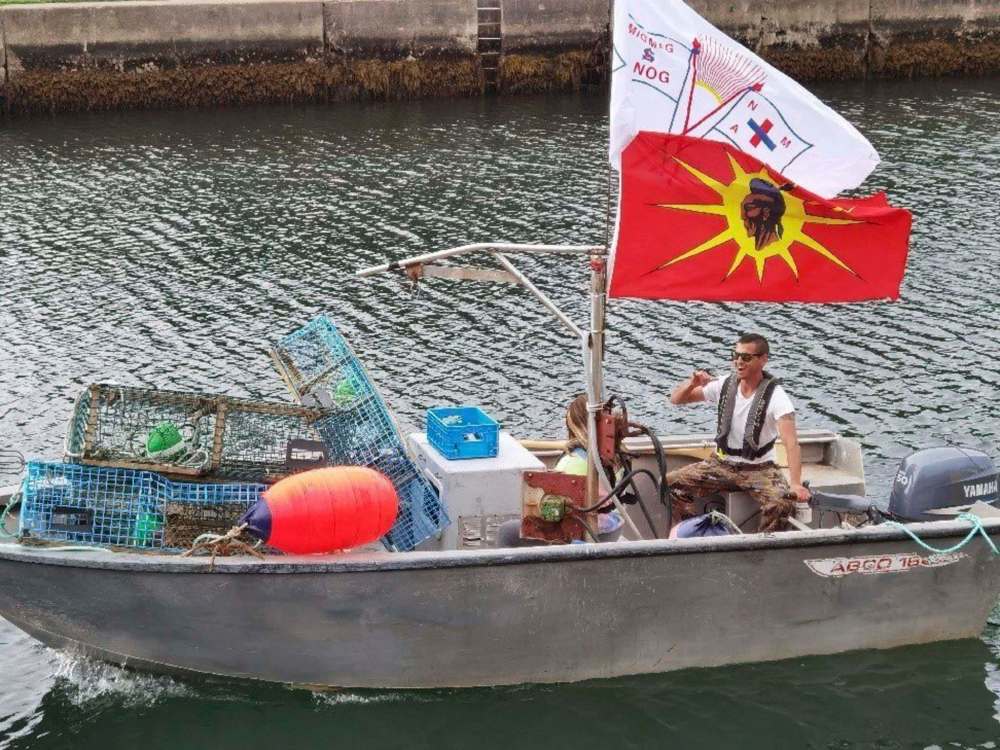 Jeff Johnson / The Canadian Press
Mi’kmaq lobster fisherman Craig Doucette and his daughter Brooklyn, head out to fish in St. Peter’s Bay near St. Peter’s, N.S..