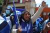 Martin Mejia / The Associated Press
Supporters of presidential candidate Luis Arce shout slogans outside his headquarters one day after elections in La Paz, Bolivia, Monday.