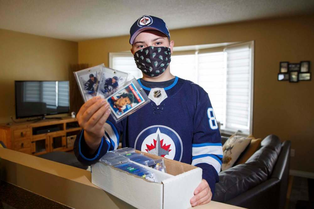 MIKE DEAL / WINNIPEG FREE PRESS
'Going to get new cards feels like Christmas,' Hubel says of his love for collecting.