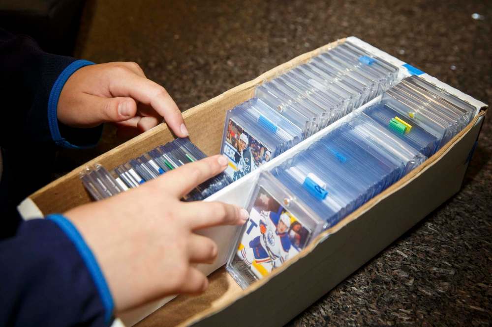 MIKE DEAL / WINNIPEG FREE PRESS
Hubel’s interest in cards took off after his first ‘big pull’, a Connor McDavid rookie card.