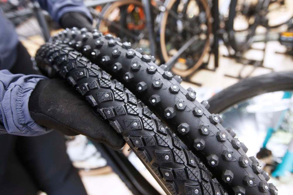 JOHN WOODS / WINNIPEG FREE PRESS
Emily Payne of Bikes and Beyond shows studded bicycle tires.