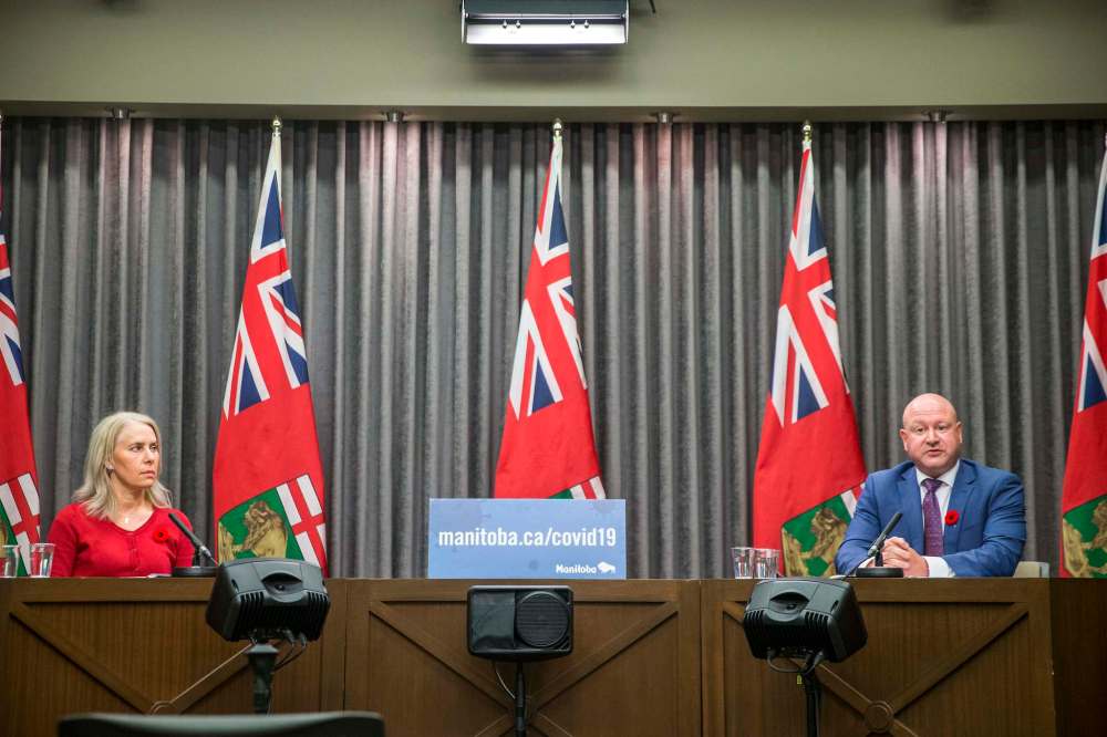 Dr. Brent Roussin, chief provincial public health officer, and Lanette Siragusa, chief nursing officer. (Mikaela MacKenzie / Winnipeg Free Press files)