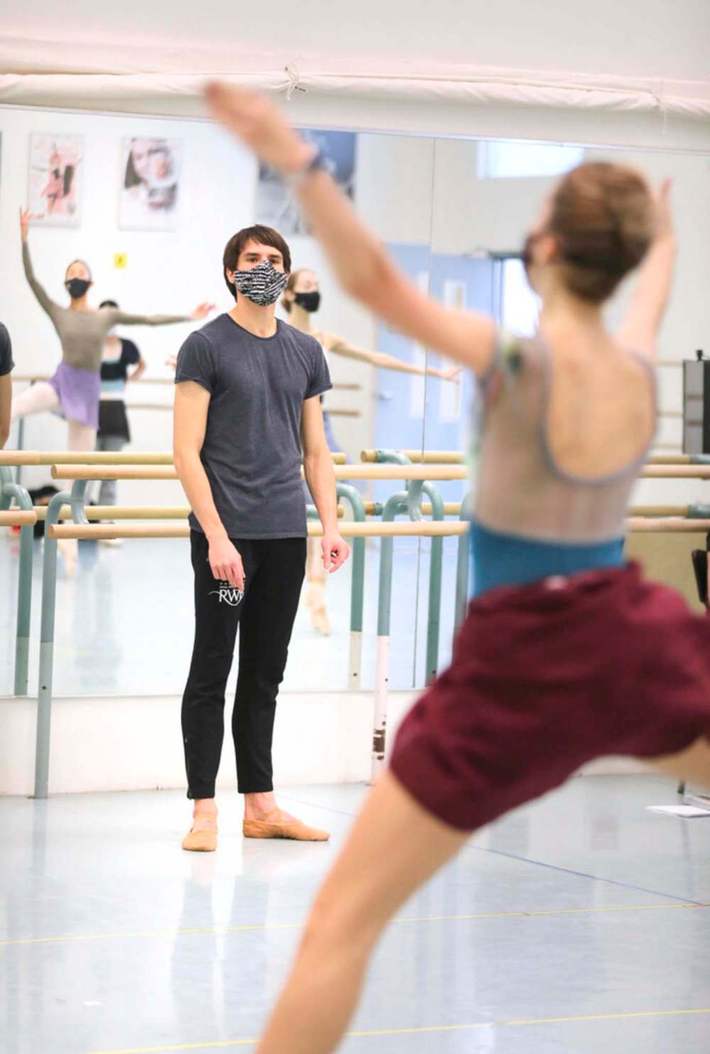 RWB instructor Peter Lancksweerdt works with company dancers during rehearsal.