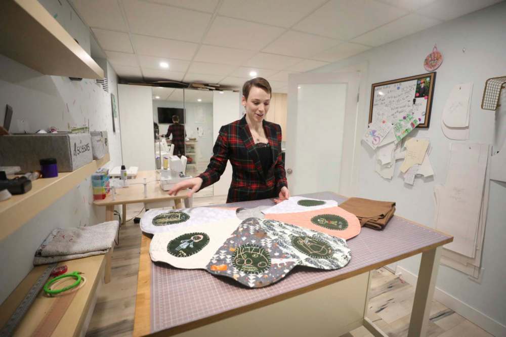 Photos by RUTH BONNEVILLE / WINNIPEG FREE PRESS
Triplets & Co. owner, Andrée-Anne Généreux, gets to work on a quilted tree skirt, which she designed from drawings made by her children.