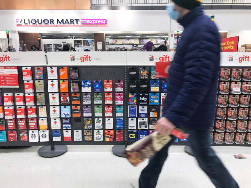 MIKE DEAL / WINNIPEG FREE PRESS
Gift cards, which had not been removed or covered up as of Friday afternoon, are considered non-essential.