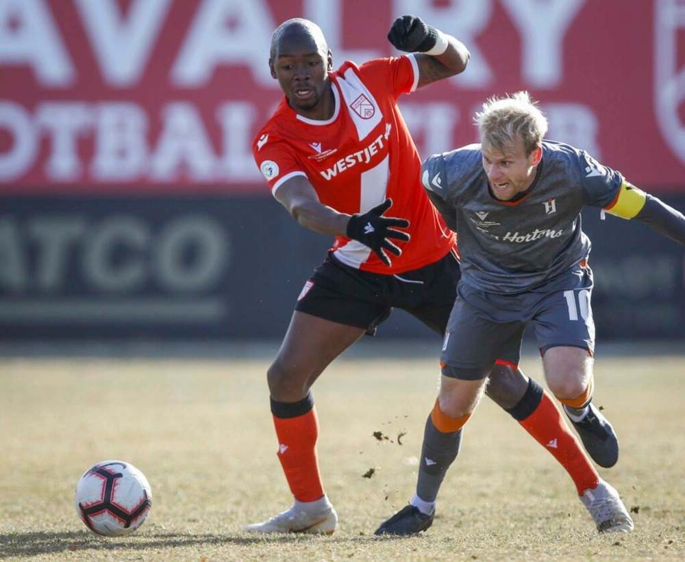 THE CANADIAN PRESS/Jeff McIntosh
Forge FC captain Kyle Bekker, right, captured the Canadian Premier League Player of the Year Award Thursday night.