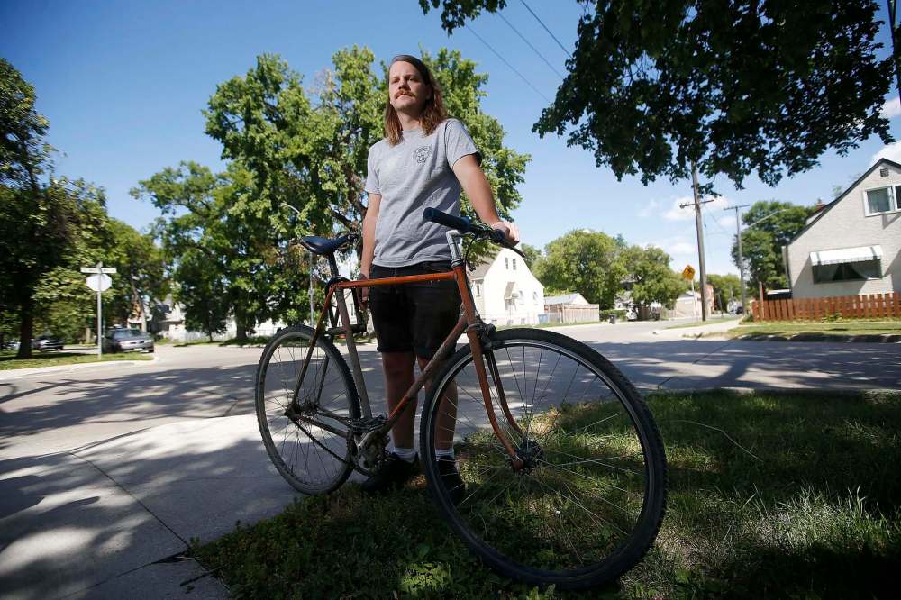 Thomas Krause, who says he was allegedly pepper sprayed by Winnipeg Police Service (WPS) officer, Jeffrey Norman, in April 2019 while he was cycling in the West End without provoking the use of force, is photographed near the incident location at Home and St Matthews Monday, July 27, 2020. Krause is still waiting for a conclusion to his case. WPS patrol sargent Jeffrey Norman has allegedly faced repeated allegations of misconduct. (John Woods / Winnipeg Free Press files)