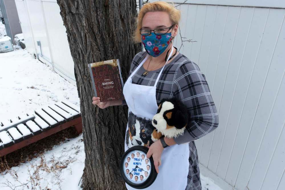 JESSE BOILY / WINNIPEG FREE PRESS
Sarah Lefebvre cherishes the two Reddit Secret Santa gifts she received that were inspired by her Bernese mountain dog Gif.