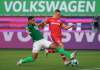 Leverkusen's 17-year-old prodigy Florian Wirtz, right, during a German Bundesliga soccer match between Wolfsburg and Bayer Leverkusen in Wolfsburg, Germany. (Peter Steffen/dpa via AP)