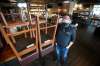 Jay Kilgour, owner of Fionn MacCool’s, says relief from the high costs of delivery apps, which is responsible for 65 per cent of his two restaurant's sales, is welcome. (John Woods / Winnipeg Free Press)