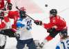 JASON FRANSON / THE CANADIAN PRESS
Canada's Cole Perfetti (11) battles for a rebound during third period against Finland in IIHF World Junior Hockey Championship action in Edmonton, Thursday, Dec. 31, 2020.