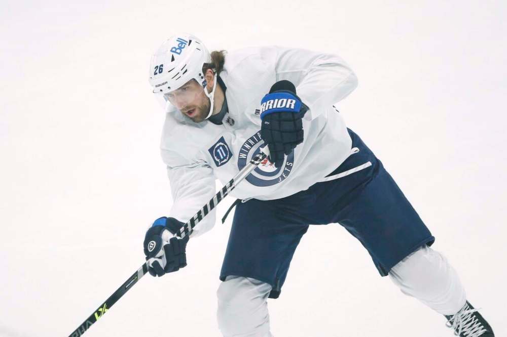Team captain Blake Wheeler leads a contingent of Minnesotans on the Winnipeg Jets. THE CANADIAN PRESS/John Woods