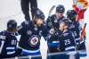 MIKAELA MACKENZIE / WINNIPEG FREE PRESS
Winnipeg Jets Blake Wheeler (centre), Patrik Laine, and Paul Stastny celebrate their third goal against the Calgary Flames at Bell MTS Place in Winnipeg on Thursday.