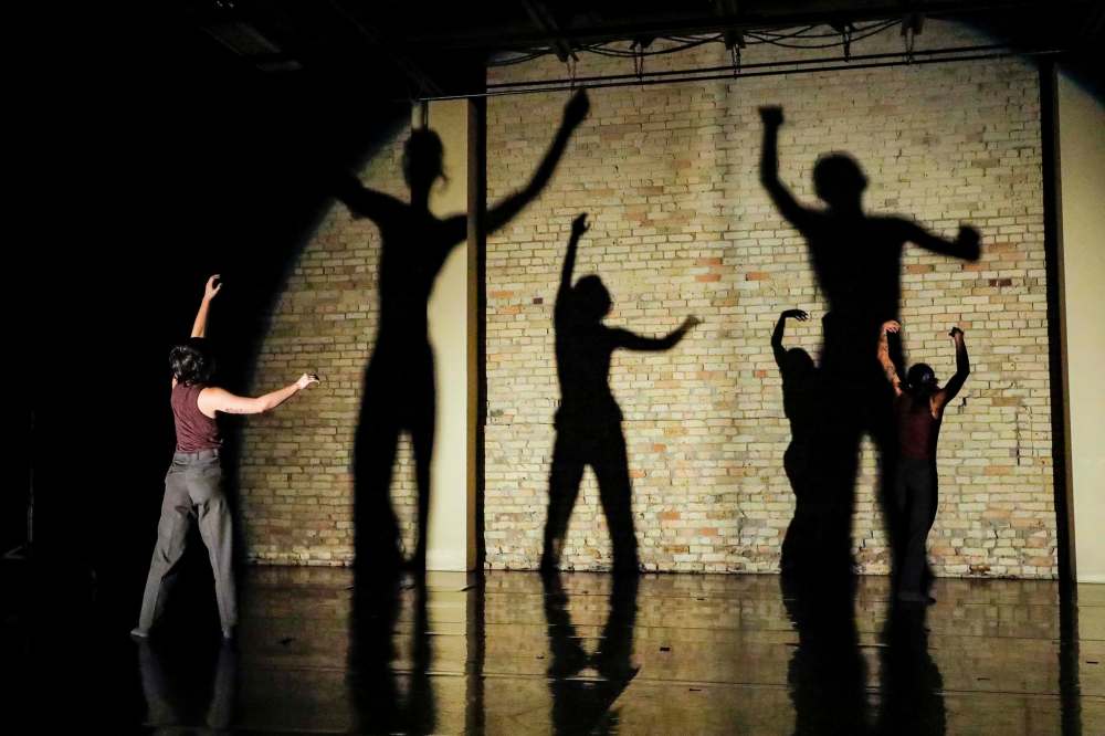 Leif Norman photo
People can’t touch, but shadows can in choreographer Jera Wolfe’s Begin Again.