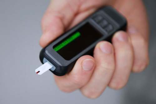 Type 1 diabetics must place a drop of blood every three hours on the strip of a device such as this.