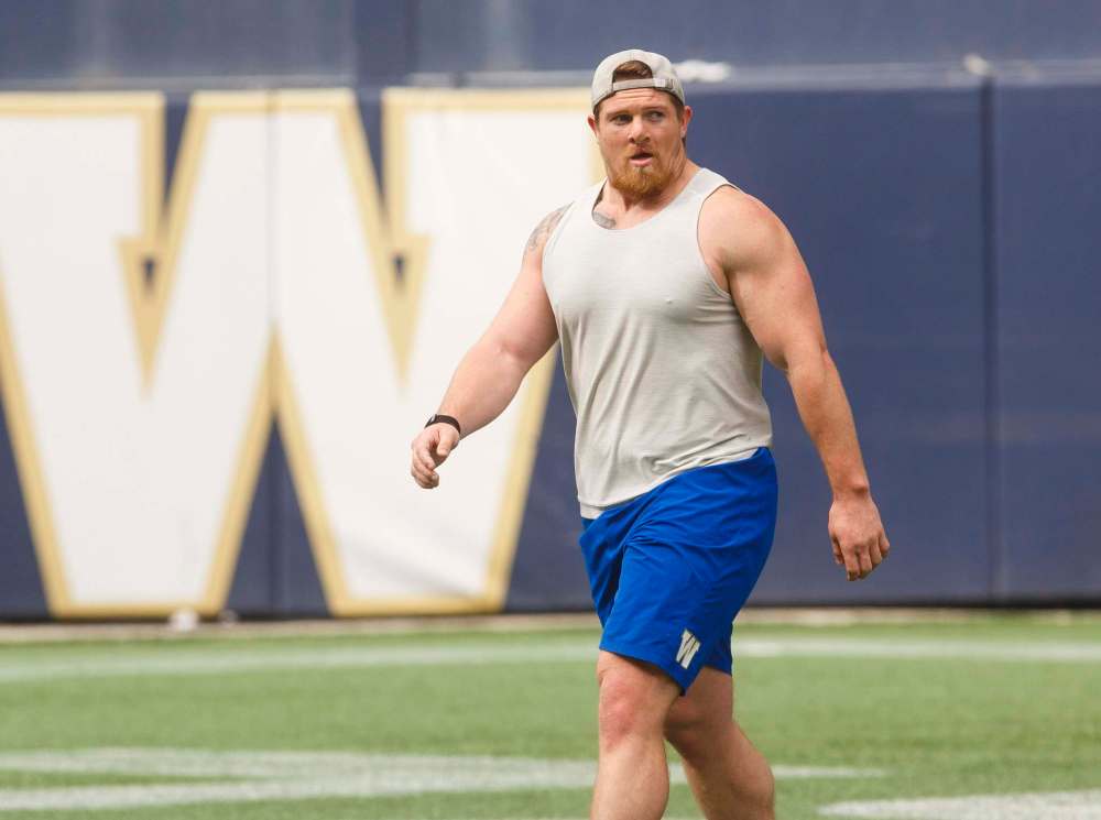MIKE DEAL / WINNIPEG FREE PRESS FILES
Winnipeg Blue Bombers middle linebacker Adam Bighill was scheduled to receive $260,000 this season but will now make approximately $115,000.