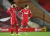 Liverpool's Mohamed Salah looks on following the English Premier League soccer match between Liverpool and Burnley in Liverpool, England, Thursday. Burnley won the match 0-1. (Peter Powell/Pool via AP)