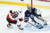 Connor Hellebuyck currently has a 2.60 goals-against average and .906 save percentage. (John Woods / The Canadian Press files)