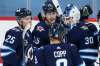 JOHN WOODS / WINNIPEG FREE PRESS
Winnipeg Jets’ players celebrate their 3-2 victory over the Calgary Flames with goaltender Laurent Brossoit in Winnipeg on Tuesday.