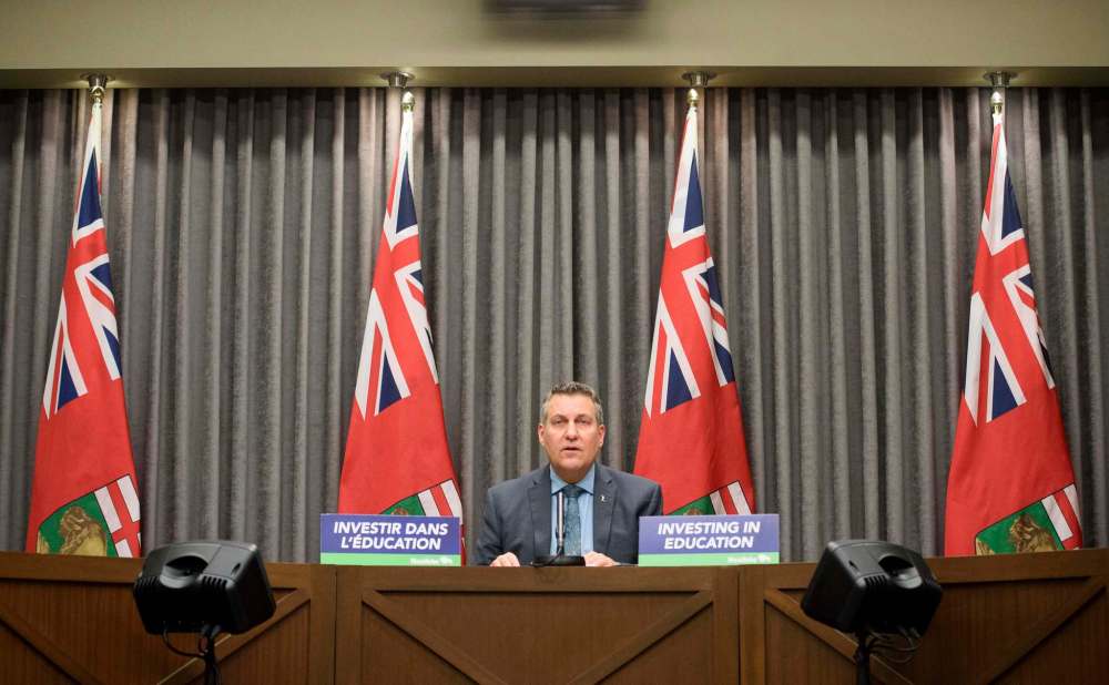 MIKE SUDOMA / WINNIPEG FREE PRESS Education Minister, Cliff Cullen, answers media questions Friday after announcing a $20.8 million dollar increase to the Funding of Schools Program, bringing the total amount of funding to $1.35 billion, a record high in Manitoba.